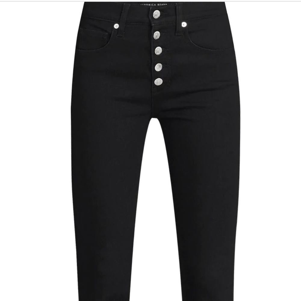 Women's Frayed High Rise Skinny ankle jean is crafted in a timeless high-rise